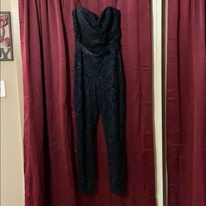 Black lace over dark blue jumpsuit size 8 by Bebe